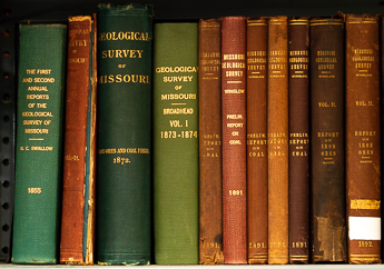 Books on a shelf that are part of the Missouri Geological Survey bibliography